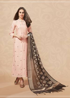 Look Pretty In This Very Beautiful Designer Readymade Kurti In Pastel Peach Color Paired With Contrasting Brown Colored Dupatta. Its Top And Dupatta Are Silk Based With A Subtle Color Pallete Which Earn You Lots Of Compliments From Onlookers. 