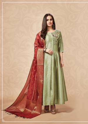 Get Ready For The Upcoming Festive And Wedding Season With This Very Beautiful Designer Readymade Kurti In Light Green Color Paired With Contrasting Maroon Colored Dupatta. This Pair Of Kurti And Dupatta Are Silk Beautified With Hand Work Over The Yoke. 