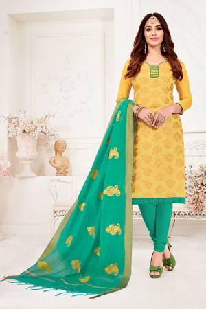 Add Some Casuals, With This Designer Dress Material In Musturd Yellow Colored Top Paired With Sea Green Colored Bottom And Dupatta. Its Top Is Fabricated On Jacquard Silk Paired With Cotton Bottom And Cotton Silk Fabricated Dupatta. Its Fabrics Are light Weight And Easy To Carry All Day Long. 