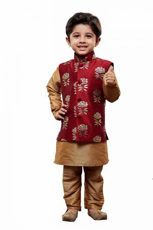 Get Your Cute Little Kids This Amazing Pair Of Kurta Pyjama With Modi\Nehru Style Jacket For The Upcoming Festive And Wedding Season. This Pair Of Kurta And Pyjama Are Fabricated On Cotton Silk Paired With Jacquard Silk Fabricated Jacket. It Is Available In All Sizes As Per Age Group. Buy Now.
