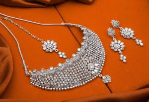 Here Is Trending Heavy Necklace Set In Silver Color Beautified With Attractive Diamond Work. Get Ready For The Upcoming Wedding Season with This Very Beautiful Necklace Set Which Can Be Paired With Any Colored Ethnic Attire, Best Suitable With Saree Or Lehenga. Buy Now.