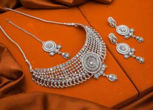 Here Is Trending Heavy Necklace Set In Silver Color Beautified With Attractive Diamond Work. Get Ready For The Upcoming Wedding Season with This Very Beautiful Necklace Set Which Can Be Paired With Any Colored Ethnic Attire, Best Suitable With Saree Or Lehenga. Buy Now.