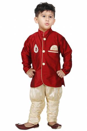 This Festive Season Give Your Child A Cute Traditional Look Wearing This Designer Readymade Sherwani Which Is Cotton Silk Based. Its Fabric Has Rich Feel And Light In Weight, Also It Is Available In All Sizes. Choose As Per The Desired Fit And Comfort. Buy Now.
