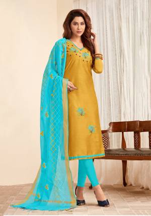 For Your Casual Wear, Grab This Designer Dress Material In Musturd Yellow And Sky Blue Color And Get This Stitched As Per Your Desired Fit And Comfort. Its Top And Bottom Are Cotton Based Paired With Chanderi Cotton Fabricated Dupatta. 