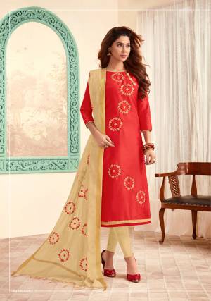 Here Is A Royal Looking Designer Suit With Rich Color Pallet In Crimson Red Colored Top Paired With Contrasting Cream Colored Bottom And Dupatta. Its Top Is Fabricated On Cotton Slub Paired with Cotton Bottom And Chanderi Cotton Fabricated Dupatta. Its Top And Dupatta are Beautified With Thread Work.