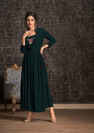 Grab This Very Pretty And Elegant Looking Designer Readymade Long Kurti In Pine Green Color Fabricated On Rayon. Its Pretty Pattern And Fabric Ensures Superb Comfort all Day Long. Buy This Kurti Now.