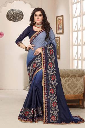 Shaded Saree Can Never Go Out Of Style, So Grab This Very Beautiful Shaded Saree In Blue & Navy Blue Color Paired With Navy Blue Colored Blouse. This Saree Is Fabricated On Soft Silk Paired With Art Silk Fabricated Blouse. It Is Beautified With Attractive Contrasting Embroidery Giving It A More Attractive Look. Buy Now.