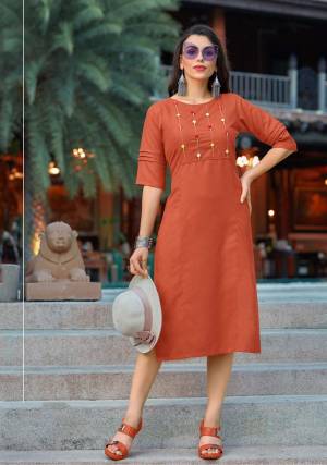 Simple and Elegant Looking Designer Straight Kurti IS Here In Rust Orange Color Fabricated On Cotton. This Pretty Readymade Kurti Is Available In All Regular Sizes, Choose As Per Your Desired Fit And Comfort. 