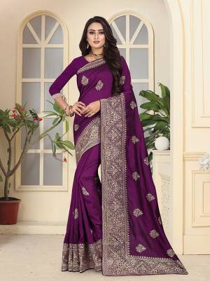 Celebrate This Festive Season With A Proper Traditional Touch Wearing This Heavy Designer Saree In Purple Color. This Saree And Blouse Are Fabricated On Soft Art Silk Beautified With Heavy Jari Embroidery And Stone Work. 