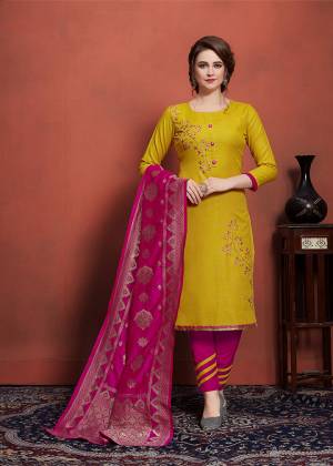 Celebrate This Festive With Beauty And Comfort And Also With Colors Wearing This Designer Straight Suit In Yellow Colored Top Paired With Contrasting Magenta Pink Colored Bottom And Dupatta. Its Embroidered Top Is Fabricated On Cotton Slub Paired With Cotton Bottom And Banarasi Art Silk Fabricated Dupatta. 