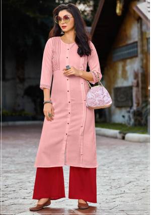 Look Pretty In This Designer Readymade Kurti Set In Pink Colored Kurti Paired With Red Colored Plazzo. It Is Fabricated On Cotton Paired With Rayon Fabricated Plazzo. Both Its Fabrics Are Soft Towards Skin And Easy To Carry All Day Long. 