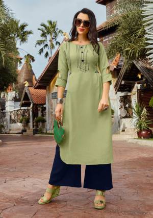 For Your Semi-Casuals, Grab This Pair Of Kurti And Plazzo In Light Green And Navy Blue Color Respectively. It Top IS Cotton Based Paired With Rayon Fabricated Bottom. Buy This Loevly Readymade Set Now.