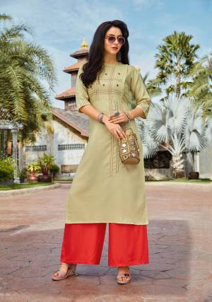Celebrate This Festive Season With Beauty And Comfort Wearing This Designer Readymade Pair Of Kurti And Plazzo In Pastel Green And Orange Color. Its Top IS Fabricated On Cotton Paired With Rayon Fabricated Bottom. Buy This Now.