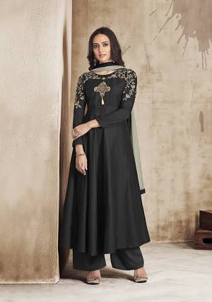 Enhance Your Personality In this Designer Readymade Suit In Black Colored Top and Plazzo Paired With Grey Colored Dupatta. This Pretty Suit Is Fabricated On Muslin Paired With Chiffon Fabricated Dupatta. 