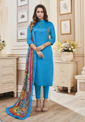 Celebrate This Festive Season With Beauty And Comfort Wearing This Designer Suit With Readymade Top And Unstitched Bottom. Its Top And Bottom Are Cotton Fabricated Paired With Muslin Fabricated Dupatta. Its Lovely Color Pallete In Blue And Multi Will Give An Attractive Look.
