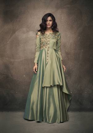 Flaunt Your Rich And Elegant Taste In This New And Unique Shade Wearing This Readymade Gown In Mint Green Color Fabricated On Satin Silk. This Pretty Gown Has Pretty Unique Pattern With Attractive Embroidery. Buy Now.