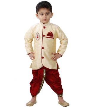 This Festive Season Give Your Child A Cute Traditional Look Wearing This Designer Readymade Sherwani With Bottom Which Is Cotton Silk Based. Its Fabric Has Rich Feel And Light In Weight, Also It Is Available In All Sizes. Choose As Per The Desired Fit And Comfort. Buy Now.