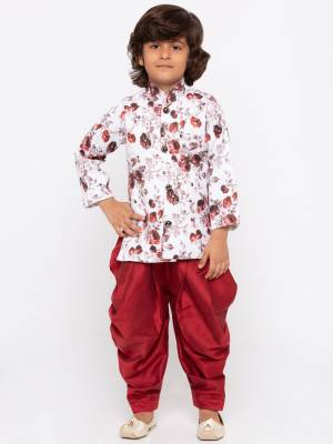 This Festive Season Give Your Child A Cute Indo-Western Look Wearing This Designer Readymade Set Of Printed Kurta And Plain Dhoti Which Is Cotton Silk Based. Its Fabric Has Rich Feel And Light In Weight, Also It Is Available In All Sizes. Choose As Per The Desired Fit And Comfort. Buy Now.