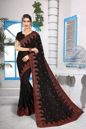 Grab This Very Beautiful Heavy Kashmiri Work Designer Saree In Black Color. This Saree And Blouse are Fabricated On Georgette Beautified With Heavy Kashmiri Embroidery With Resham And Stone. Buy Now.