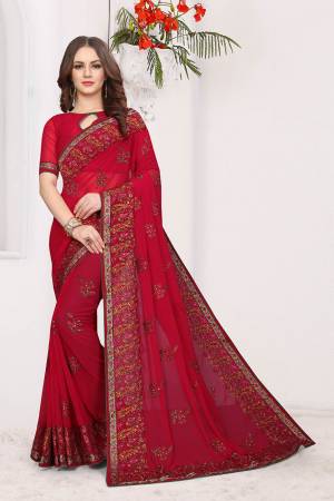 Simple And Elegant Looking Designer Saree With Attractive Kashmiri Work IS Here Red Color. This Saree and Blouse are Georgette Based Beautified With Detailed Embroidery Giving It An Attractive Look. 