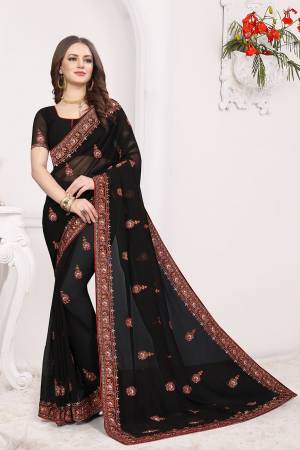 Simple And Elegant Looking Designer Saree With Attractive Kashmiri Work IS Here Black Color. This Saree and Blouse are Georgette Based Beautified With Detailed Embroidery Giving It An Attractive Look. 