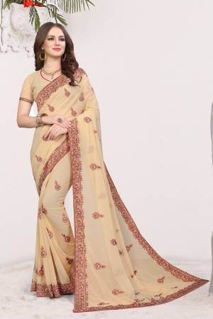 Grab This Very Beautiful Heavy Kashmiri Work Designer Saree In Beige Color. This Saree And Blouse are Fabricated On Georgette Beautified With Heavy Kashmiri Embroidery With Resham And Stone. Buy Now.