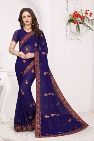 Simple And Elegant Looking Designer Saree With Attractive Kashmiri Work IS Here Royal Blue Color. This Saree and Blouse are Georgette Based Beautified With Detailed Embroidery Giving It An Attractive Look. 