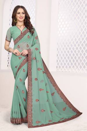 Grab This Very Beautiful Heavy Kashmiri Work Designer Saree In Pastel Green Color. This Saree And Blouse are Fabricated On Georgette Beautified With Heavy Kashmiri Embroidery With Resham And Stone. Buy Now.