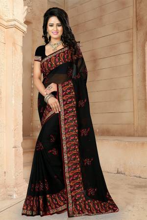 If You Have And Eye For Embroidery Than Grab This Very Beautiful Designer Saree In Black Color With Heavy Kashmiri Embroidery And Stone Work. This Pretty Saree And Blouse Are Fabricated On Georgette. Its Fabric Is Light Weight And Its Lovely Embroidery Gives An Attractive Look Over All. 
