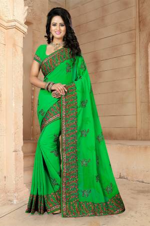 If You Have And Eye For Embroidery Than Grab This Very Beautiful Designer Saree In Green Color With Heavy Kashmiri Embroidery And Stone Work. This Pretty Saree And Blouse Are Fabricated On Georgette. Its Fabric Is Light Weight And Its Lovely Embroidery Gives An Attractive Look Over All. 