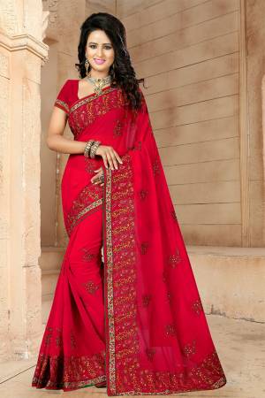 If You Have And Eye For Embroidery Than Grab This Very Beautiful Designer Saree In Red Color With Heavy Kashmiri Embroidery And Stone Work. This Pretty Saree And Blouse Are Fabricated On Georgette. Its Fabric Is Light Weight And Its Lovely Embroidery Gives An Attractive Look Over All. 