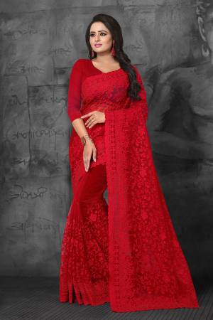 Adorn The Angelic Look In This Heavy Designer Tone To Tone Embroidered Saree In Red Color. This Saree And Blouse Are Fabricated On Net Highlighted With Tone To Tone Ceramic Stone Work All Over It. 