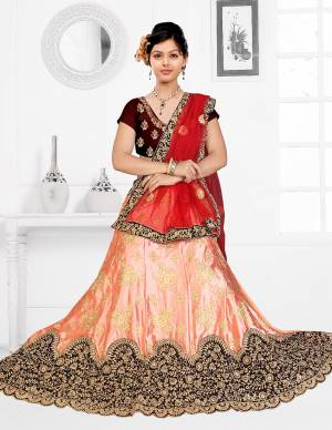 Go Colorful With This Heavy Designer Lehenga Choli For Your Bridal Wear In Brown Colored Blouse Paired With Peach Colored Lehenga And Red Colored Dupatta. This Lehenga Choli IS Fabricated On Satin Silk Paired With Net Fabricated Dupatta. 