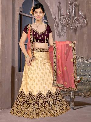 Go Colorful With This Heavy Designer Lehenga Choli For Your Bridal Wear In Brown Colored Blouse Paired With Cream Colored Lehenga And Pink Colored Dupatta. This Lehenga Choli IS Fabricated On Satin Silk Paired With Net Fabricated Dupatta. 