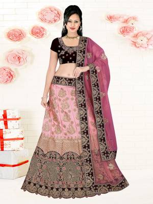 Go Colorful With This Heavy Designer Lehenga Choli For Your Bridal Wear In Black Colored Blouse Paired With Light Pink Colored Lehenga And Pink Colored Dupatta. This Lehenga Choli IS Fabricated On Satin Silk Paired With Net Fabricated Dupatta. 