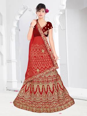 Here Is New And Unique Patterned Designer Bridal Lehenga Choli In Maroon Colored Blouse Paired With Red Colored Lehenga And Dupatta. This Lehenga Choli Is Fabricated On Satin Silk Paired With Net Fabricated Dupatta. Buy Now.