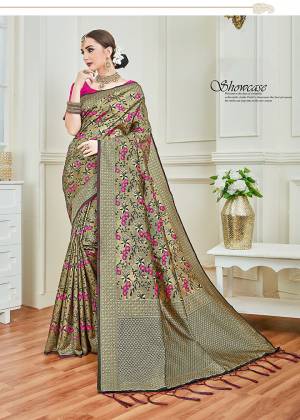 Here Is A Rich Looking Designer Silk Based Saree In Golden And Dark Pink Color Which Will Give A Royal Look To Your Personality. This Saree Is Fabricated On Soft Silk Paired With Art Silk Fabricated Blouse. 