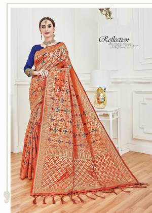 Shine Bright In This Designer Orange Colored Saree Paired With Contrasting Royal Blue Colored Blouse. This Saree And Blouse are Fabricated on Soft And Art Silk Respectively. Buy This Pretty Saree Now.