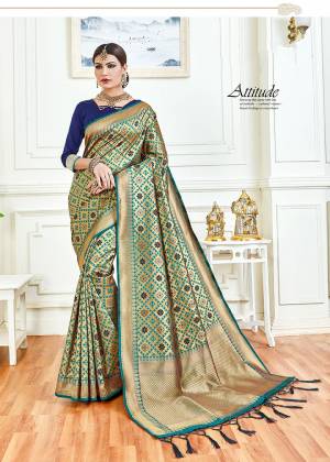 Here Is A Rich Looking Designer Silk Based Saree In Golden And Navy Blue Color Which Will Give A Royal Look To Your Personality. This Saree Is Fabricated On Soft Silk Paired With Art Silk Fabricated Blouse. 