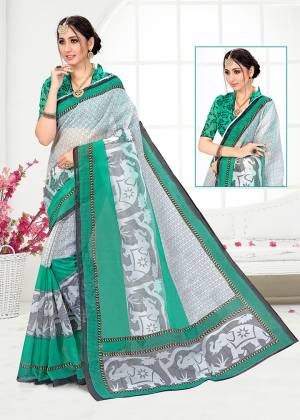 Add Some Casuals With This Very Pretty Saree In Off-White And Sea Green Color. This Saree And Blouse are Fabricated On Cotton Beautified With Prints All Over. Its Fabric Is Light In Weight And Easy To Carry All Day Long. 