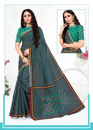 For Your Casual Or Semi-Casual Wear, Grab This Pretty Simple Printed Saree In Black And Sea Green Color. This Saree And Blouse are Fabricated On Cotton Which Is Durable And Easy To Care For. 