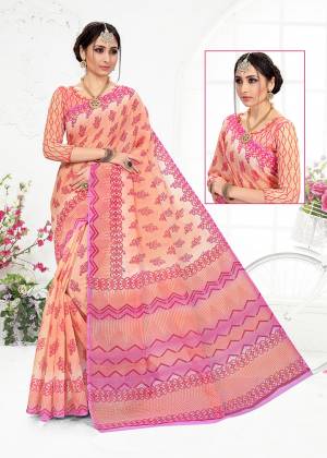 Add Some Casuals With This Very Pretty Saree In Peach Color. This Saree And Blouse are Fabricated On Cotton Beautified With Prints All Over. Its Fabric Is Light In Weight And Easy To Carry All Day Long. 