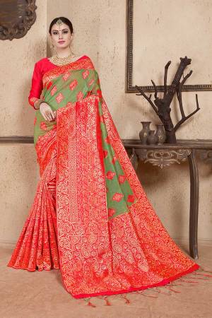 Shine Bright Wearing This Designer Heavy Weaved Saree In Green & Red Color Paired With Red Colored Blouse. This Saree And Blouse Are Fabricated On Soft Art Silk Beautified With Weave. It Is Light Weight And Easy To Drape. 