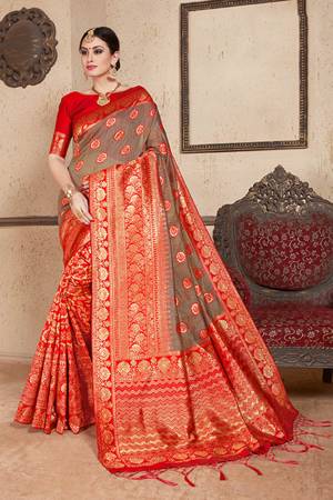 Shine Bright Wearing This Designer Heavy Weaved Saree In Grey & Red Color Paired With Red Colored Blouse. This Saree And Blouse Are Fabricated On Soft Art Silk Beautified With Weave. It Is Light Weight And Easy To Drape. 