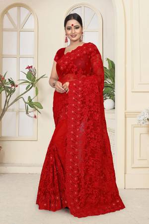 Adorn The Angelic Look In This Heavy Designer Tone To Tone Embroidered Saree In Red Color. This Saree And Blouse Are Fabricated On Net Highlighted With Tone To Tone Ceramic Stone Work All Over It