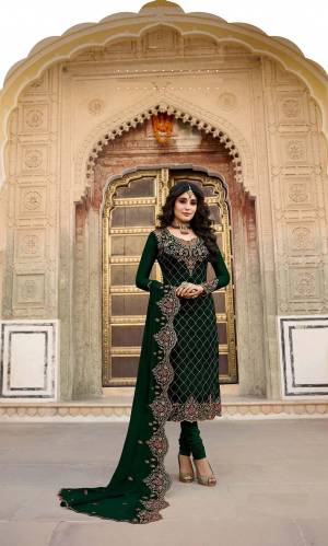 Get Ready For The Upcoming Festive And Wedding Season With This Heavy Designer Straight Suit In All Over Dark Green Color. Its Heavy Embroidered Top And Dupatta are Fabricated On Georgette Paired With Santoon Fabricated Bottom. Its Contrasting Embroidery And Stone Work Is Giving A More Enhnaced And Attractive Look. 