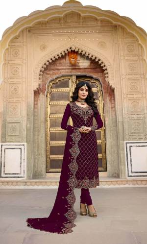 Get Ready For The Upcoming Festive And Wedding Season With This Heavy Designer Straight Suit In All Over Wine Color. Its Heavy Embroidered Top And Dupatta are Fabricated On Georgette Paired With Santoon Fabricated Bottom. Its Contrasting Embroidery And Stone Work Is Giving A More Enhnaced And Attractive Look. 