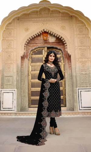 Get Ready For The Upcoming Festive And Wedding Season With This Heavy Designer Straight Suit In All Over Black Color. Its Heavy Embroidered Top And Dupatta are Fabricated On Georgette Paired With Santoon Fabricated Bottom. Its Contrasting Embroidery And Stone Work Is Giving A More Enhnaced And Attractive Look. 