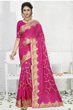 Bright And Visually Appealing Color Is Here With This Heavy Designer Saree In Rani Pink Color. This Saree Is Georgette Based Paired With Art Silk Fabricated Blouse. 