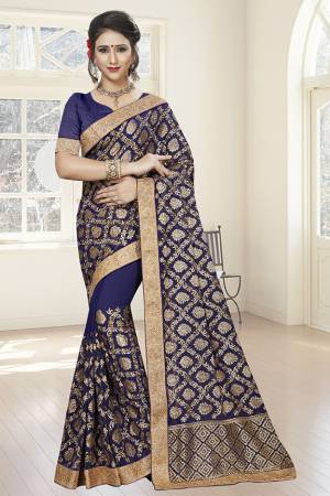 Enhance Your Personality Wearing This Heavy Embroidered Designer Saree In Navy Blue Color. This Saree Is Fabricated On Georgette Paired With Art Silk Fabricated Blouse. Its Fabric Is Durable And Easy To Carry All Day Long.